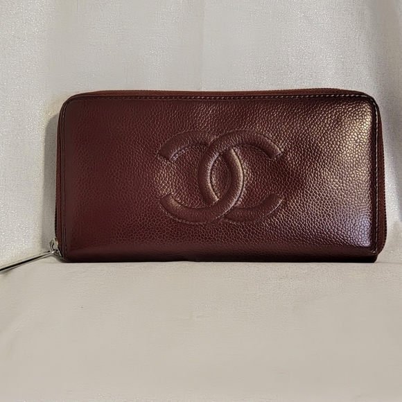 CHANEL Handbags - CHANEL Burgundy Zip Around Long Wallet with Signature Logo